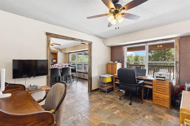 50 Rd P78, Bailey, CO 80421 - office featuring ceiling fan, a textured ceiling, and stone finish floors