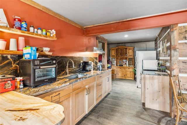 50 Rd P78, Bailey, CO 80421 - kitchen featuring a sink, wood finished floors, light stone countertops, open shelves, and freestanding refrigerator