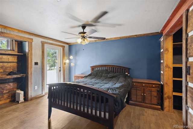 50 Rd P78, Bailey, CO 80421 - bedroom featuring access to outside, wood finished floors, and ceiling fan