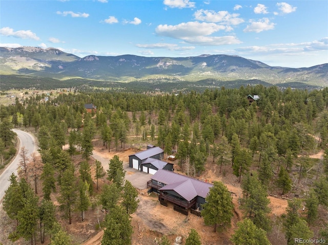 50 Rd P78, Bailey, CO 80421 - view of subject property featuring mountains and a heavily wooded area