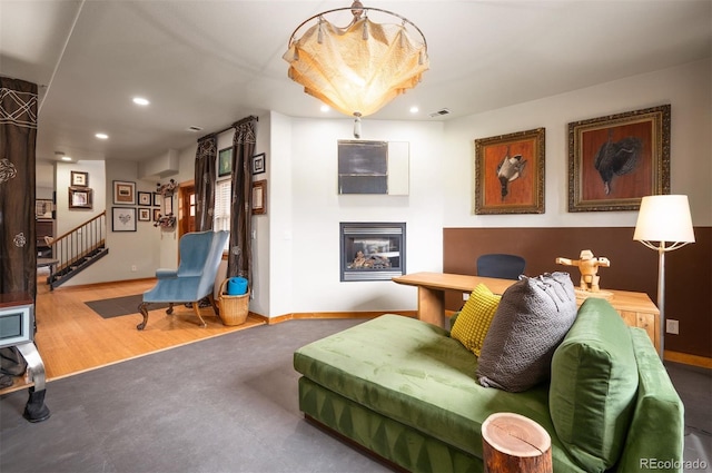 469 Elati St, Denver, CO 80204 - living room with a glass covered fireplace, baseboards, stairway, and recessed lighting