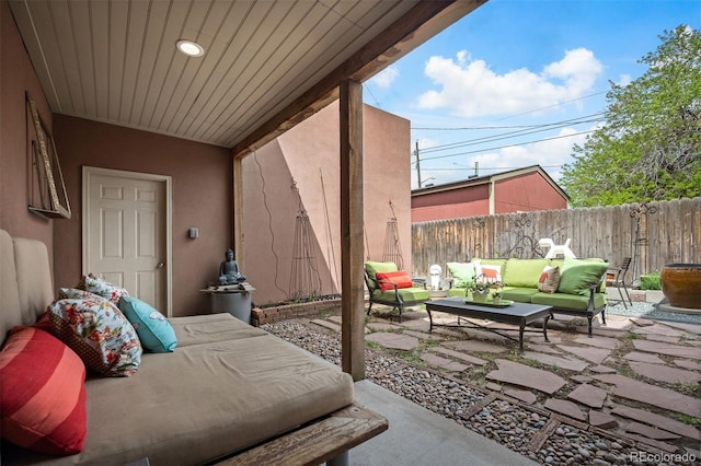 469 Elati St, Denver, CO 80204 - view of patio / terrace with outdoor lounge area and fence
