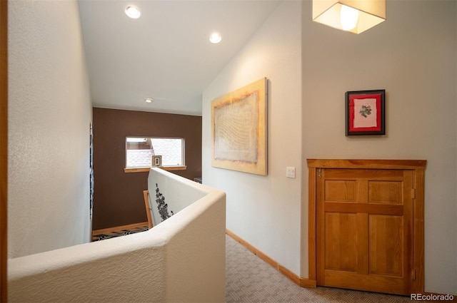 469 Elati St, Denver, CO 80204 - corridor featuring recessed lighting, baseboards, and light colored carpet