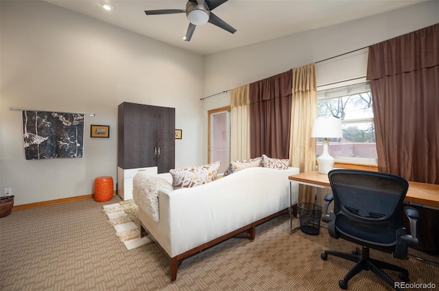 469 Elati St, Denver, CO 80204 - interior space with carpet flooring, a ceiling fan, and baseboards