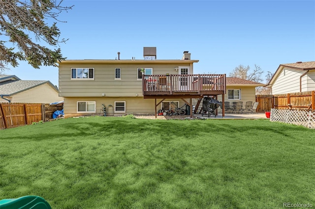 2034 S Idalia St, Aurora, CO 80013 - back of property with a deck, a patio area, and a chimney