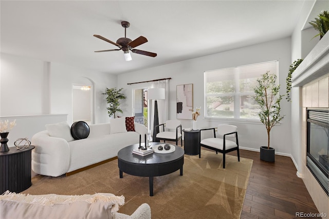 23421 E Long Pl, Aurora, CO 80016 - living area featuring wood finished floors, a ceiling fan, and a tile fireplace