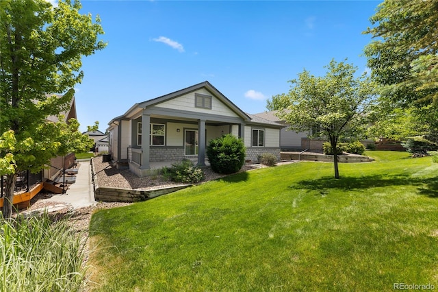 23421 E Long Pl, Aurora, CO 80016 - view of front of home with a front lawn and covered porch