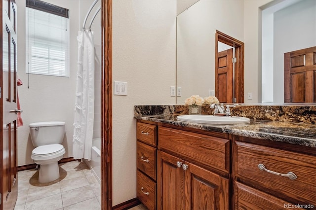 full bathroom featuring vanity, toilet, tile patterned floors, and shower / bath combo with shower curtain