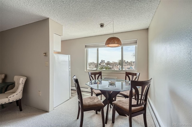 1045 N Pennsylvania St Unit 601, Denver, CO 80203 - dining room with light carpet, a baseboard heating unit, and a textured ceiling