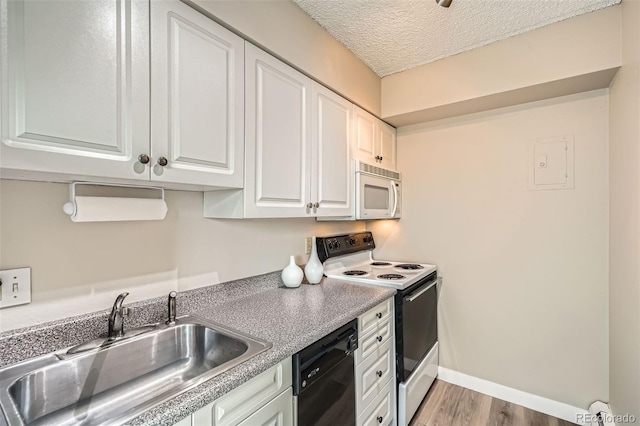 1045 N Pennsylvania St Unit 601, Denver, CO 80203 - kitchen with white appliances, a sink, white cabinetry, a textured ceiling, and light wood-type flooring