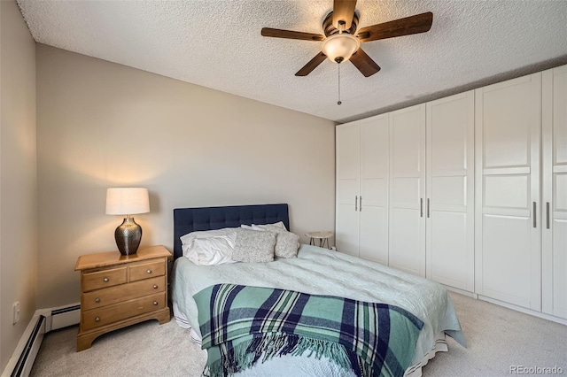 1045 N Pennsylvania St Unit 601, Denver, CO 80203 - bedroom featuring light colored carpet, a textured ceiling, ceiling fan, and a baseboard radiator