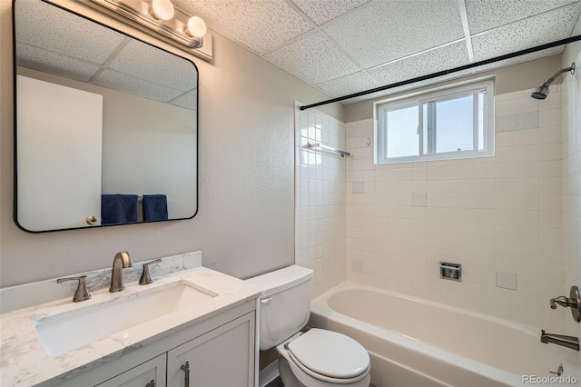 1045 N Pennsylvania St Unit 601, Denver, CO 80203 - full bath featuring a drop ceiling, toilet, vanity, and tub / shower combination