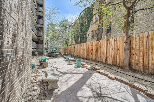 1045 N Pennsylvania St Unit 601, Denver, CO 80203 - fenced backyard with a patio area and outdoor dining area