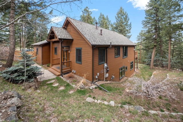 27711 Moffat Rd, Evergreen, CO 80439 - exterior space with roof with shingles