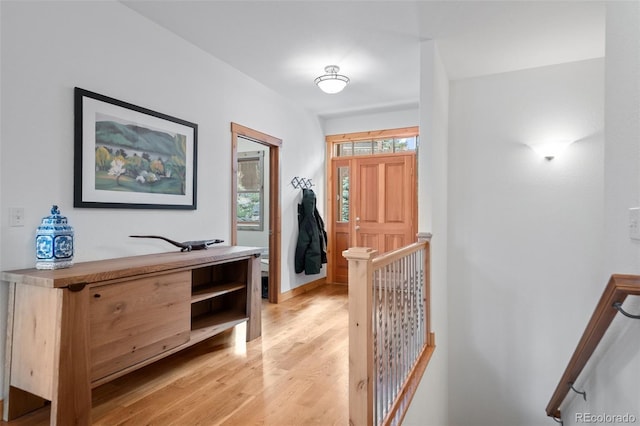27711 Moffat Rd, Evergreen, CO 80439 - foyer entrance featuring light wood-style floors