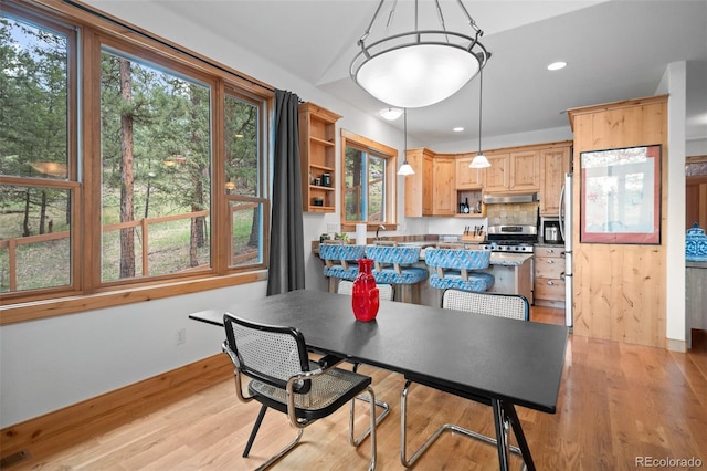 27711 Moffat Rd, Evergreen, CO 80439 - dining room with recessed lighting, light wood finished floors, and visible vents