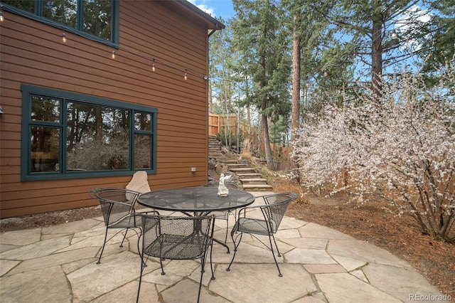 27711 Moffat Rd, Evergreen, CO 80439 - view of patio with outdoor dining area and stairway