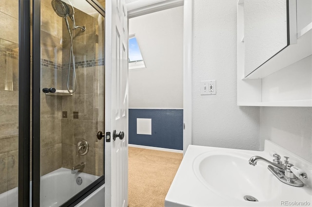 bathroom with vanity and tiled shower / bath combo