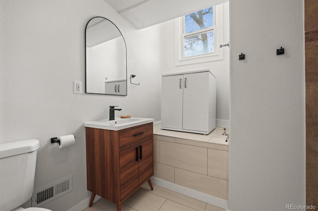 2336 N High St, Denver, CO 80205 - bathroom featuring vanity and tile patterned flooring