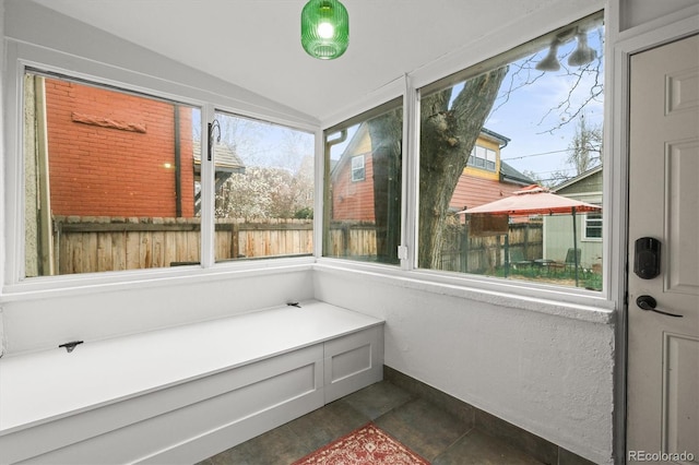 2336 N High St, Denver, CO 80205 - unfurnished sunroom featuring vaulted ceiling