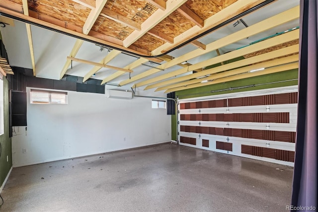 2336 N High St, Denver, CO 80205 - garage featuring baseboards