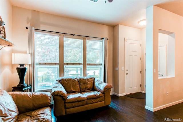 2346 Central Park Blvd, Denver, CO 80238 - living area featuring dark wood-style floors, baseboards, and a ceiling fan