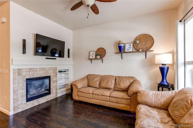 2346 Central Park Blvd, Denver, CO 80238 - living room with ceiling fan, wood finished floors, a fireplace, and baseboards
