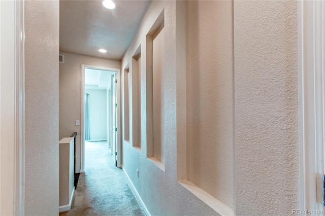 2346 Central Park Blvd, Denver, CO 80238 - hall featuring a textured wall, recessed lighting, and carpet flooring