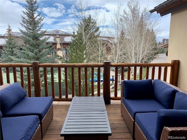 deck with outdoor lounge area