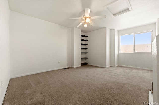 unfurnished bedroom featuring ceiling fan and carpet floors