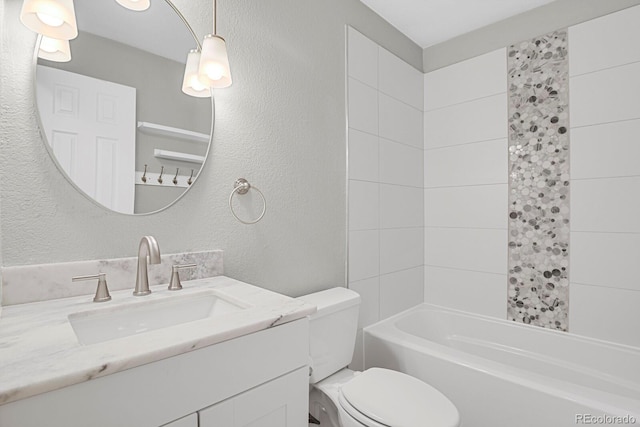 bathroom featuring vanity,  shower combination, toilet, and a textured wall