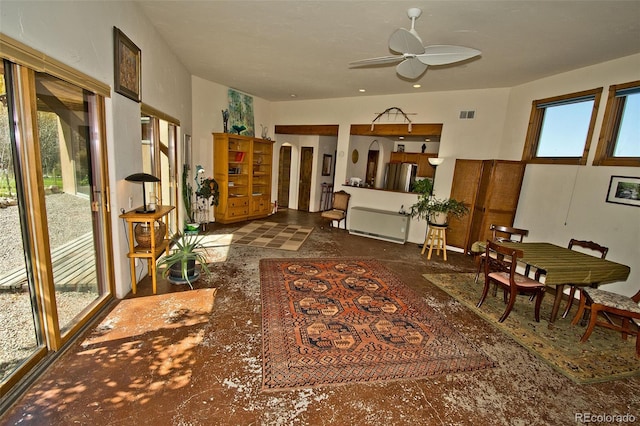 sitting room featuring ceiling fan