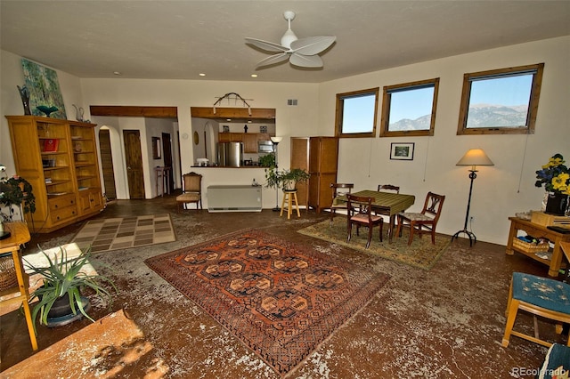 interior space featuring ceiling fan