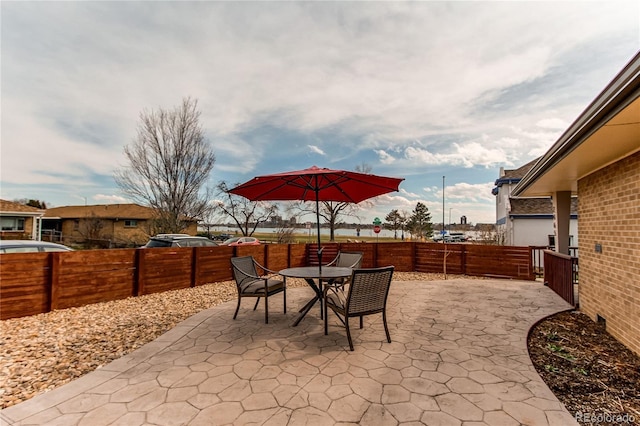 view of patio / terrace with outdoor dining space and a fenced backyard