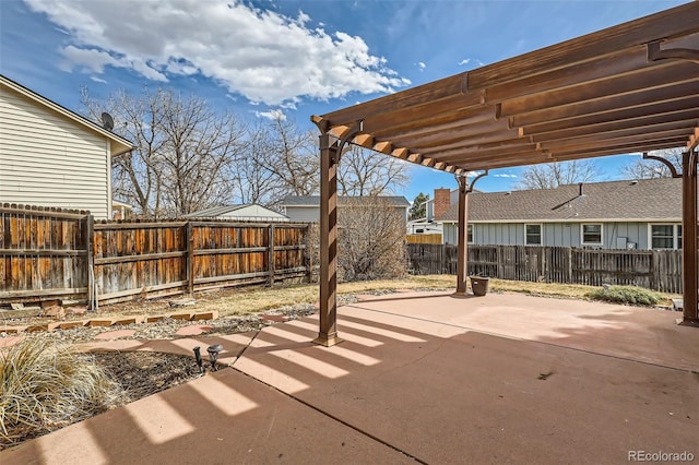 view of patio / terrace featuring a fenced backyard and a pergola