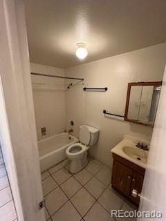 bathroom with toilet, tile patterned flooring, shower / washtub combination, and vanity