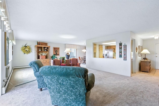 14050 E Linvale Pl Unit 601, Aurora, CO 80014 - living room with light carpet, a textured ceiling, and baseboard heating