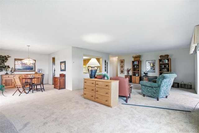 14050 E Linvale Pl Unit 601, Aurora, CO 80014 - living room with carpet floors and a chandelier