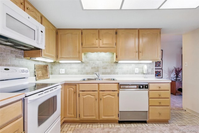 14050 E Linvale Pl Unit 601, Aurora, CO 80014 - kitchen with white appliances, light countertops, light brown cabinetry, and backsplash