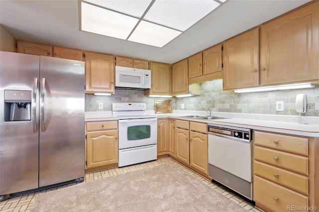 14050 E Linvale Pl Unit 601, Aurora, CO 80014 - kitchen featuring white appliances, light countertops, backsplash, and light brown cabinets