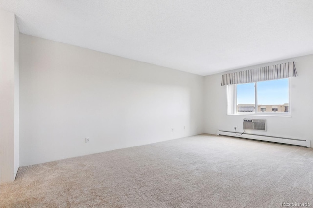 14050 E Linvale Pl Unit 601, Aurora, CO 80014 - carpeted empty room featuring a baseboard radiator and a wall unit AC