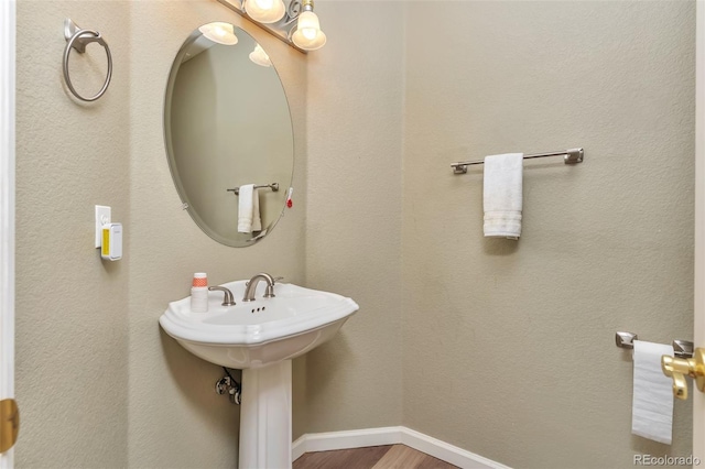29852 E 163rd Pl, Brighton, CO 80603 - bathroom with wood finished floors and baseboards