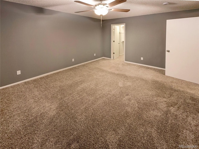 unfurnished room with carpet floors, a textured ceiling, and ceiling fan