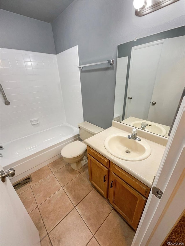 full bathroom featuring tile patterned floors, toilet, shower / bath combination, and vanity