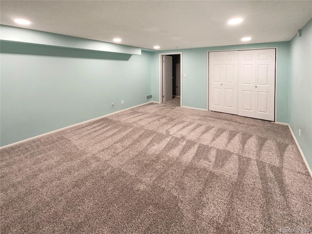 basement featuring carpet