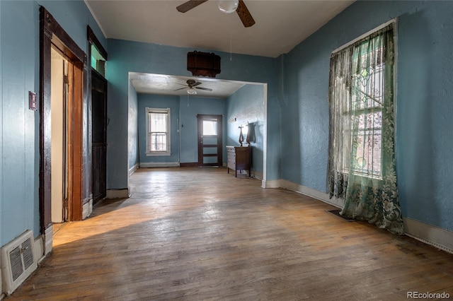 interior space with hardwood / wood-style flooring and ceiling fan