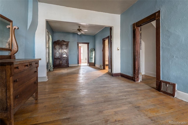 entrance foyer with hardwood / wood-style flooring and ceiling fan