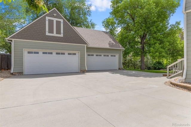 7996 Bradburn Blvd, Westminster, CO 80030 - garage featuring driveway