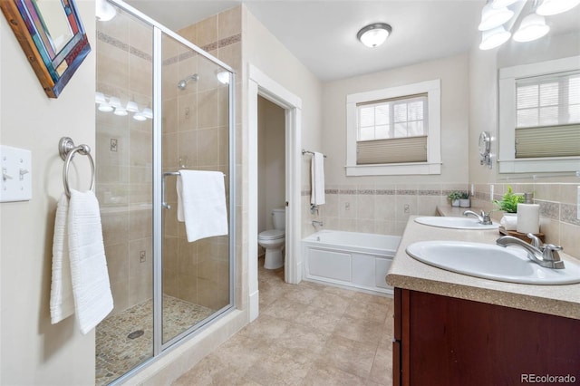 7996 Bradburn Blvd, Westminster, CO 80030 - bathroom with toilet, a shower stall, double vanity, and a bath