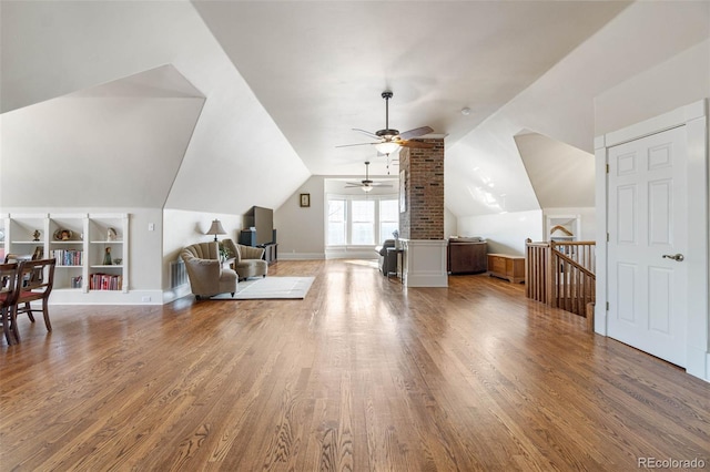 7996 Bradburn Blvd, Westminster, CO 80030 - bonus room with built in shelves, wood finished floors, a ceiling fan, and lofted ceiling